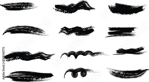 Collection of abstract black brush strokes and splatter textures