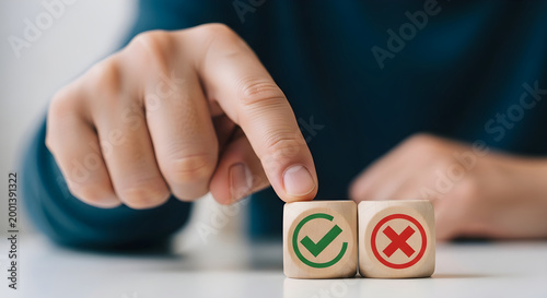 A person chooses between correct and incorrect options on wooden blocks.