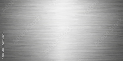 Tableau sur toile Brushed metal texture showing a shiny silver steel plate surface with industrial