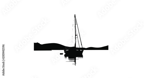 black silhouette of a sailboat on water at sunset