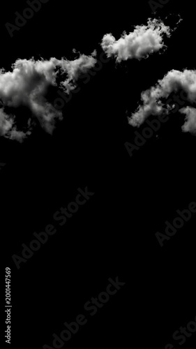 Isolated white clouds float dramatically against a deep black background, creating an ethereal and striking contrast perfect for atmospheric overlays, digital composites, or conceptual design