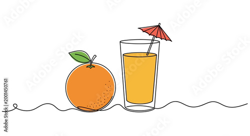Fresh orange juice with umbrella in glass next to whole orange fruit