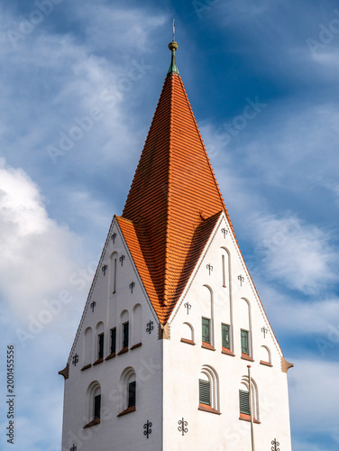 White church tower with red roof of Sanct Severin Kirke, Haderslev, South Jutland, Southern Denmark