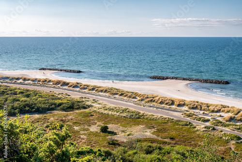 View from Nordbjerg over Nordstrand, Anholt island, Denmark, with dunes, sandy beach and breakwaters at Kattegat coast