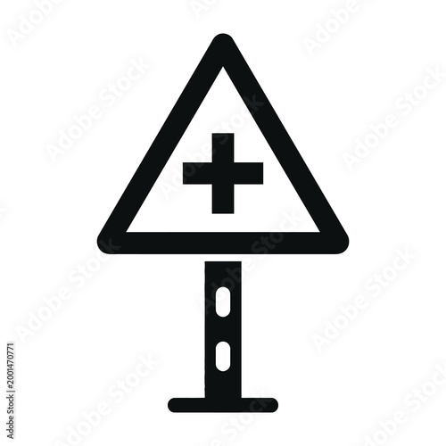 Warning sign with cross symbol on road signpost