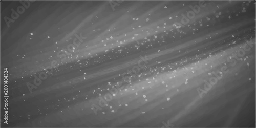 Abstract, artistic composition of gently streaming light with sparkling, textured particles in shades of grey creates a minimalist visual experience, evoking a sense of tranquility and movement.