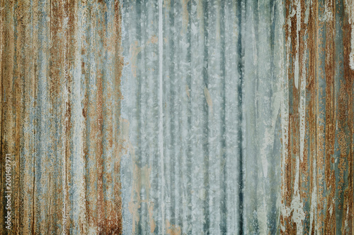Old zinc wall texture background, rusty on galvanized metal panel sheeting.