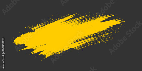Vibrant yellow brushstroke on a textured, deep gray background creates a bold visual statement. 