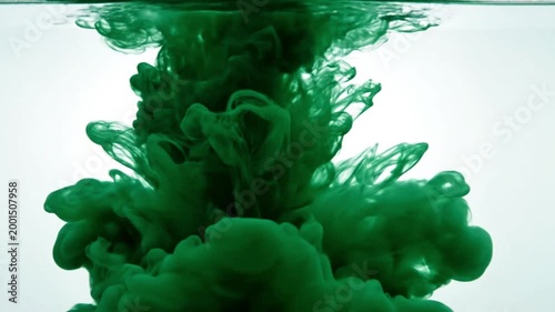 Dark Green Ink Cloud Dissolving in Clear Water Abstract Motion
