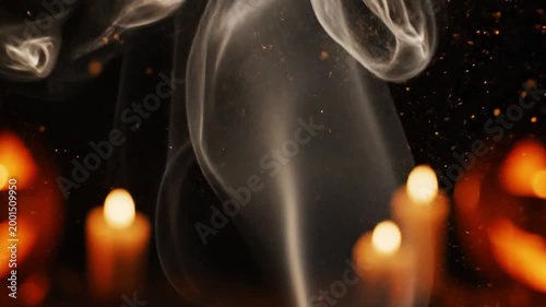 Spooky Halloween Night with Glowing Pumpkins and Mystical Smoke