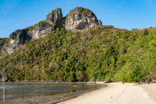 Sandy Beach and Karst Peaks Reflected in Tidal Bay, Koh Phaluai, Thailand
