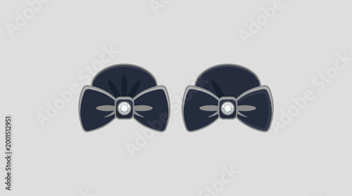 Pair of elegant navy blue bow tie hair accessories with decorative buttons.