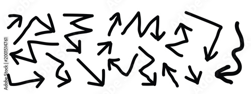 Brush, marker drawn bold arrows set. Collection of hand drawn doodle thick arrows in different directions.