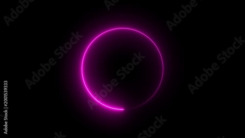 A bright glowing neon pink circle frame with a vibrant light effect isolated on a solid dark black background