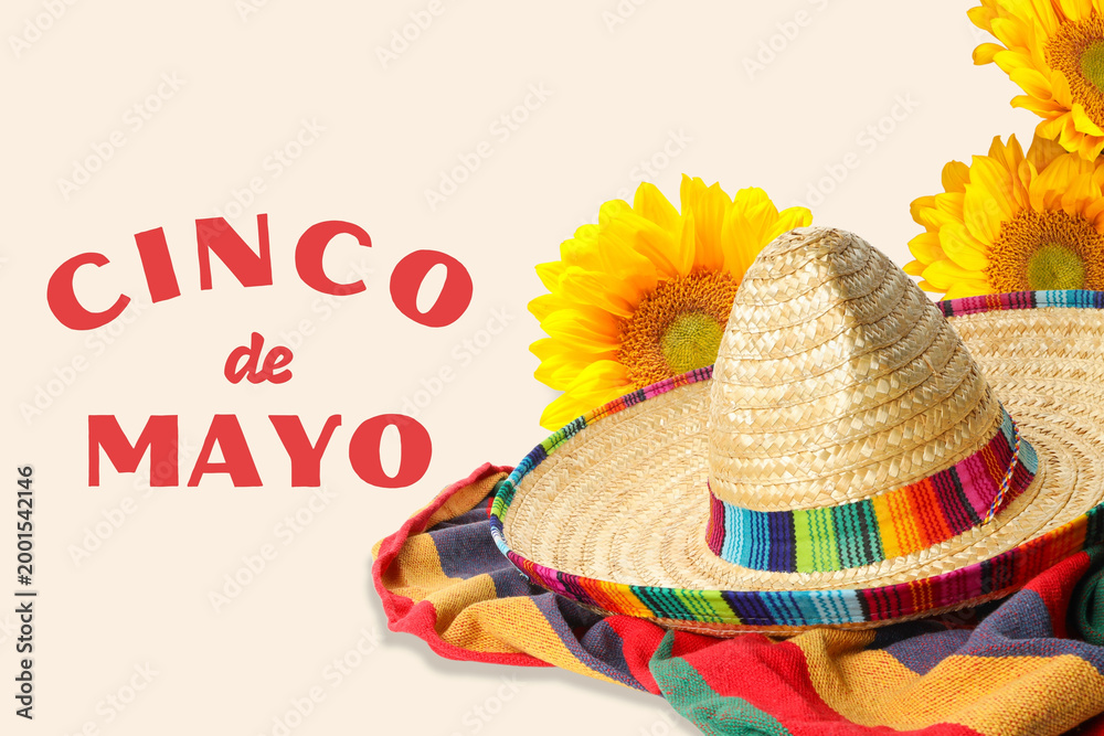 Fototapeta premium Cinco de Mayo, Sombrero and sunflowers are arranged for the holiday