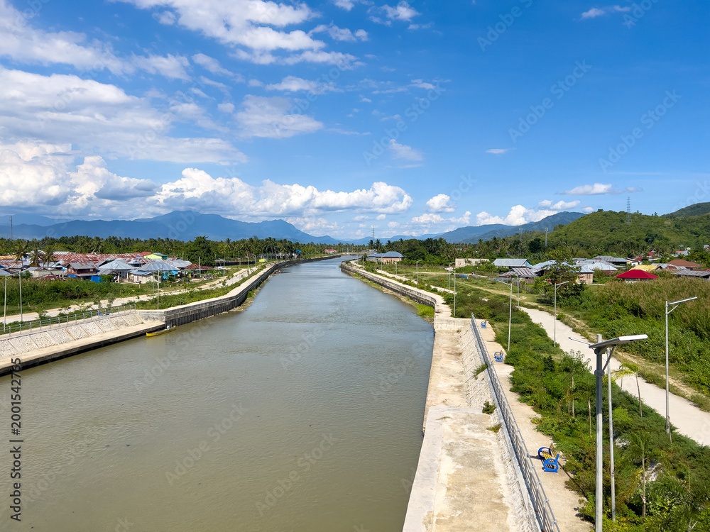 Fototapeta premium Canal Flowing Through a Rural Town