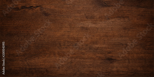 Wooden surface exhibiting a deep, rich brown hue, perfect for textures and backgrounds.