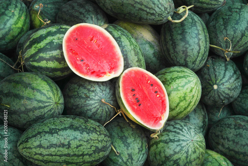 Many ripe watermelons as background	