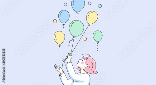 Little girl holding colorful balloons high.
