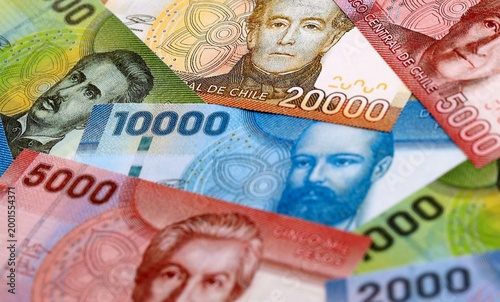 Картината върху платно Chilean peso money bills pile on table