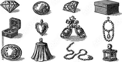 Diamond and pendant pieces arranged with boxes on white backdrop