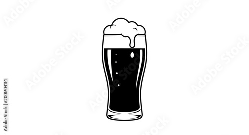 Frosted glass of dark stout beer with creamy foam head on isolated white background, refreshing beverage concept