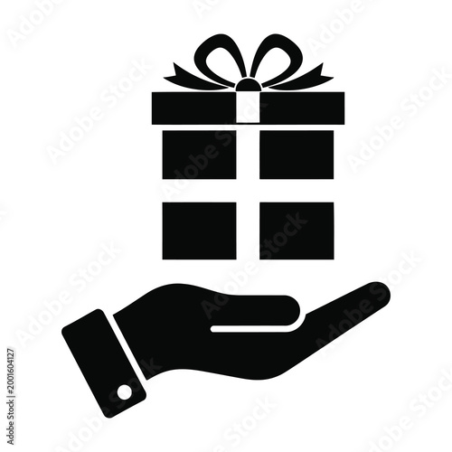 Hand holding gift box with ribbon