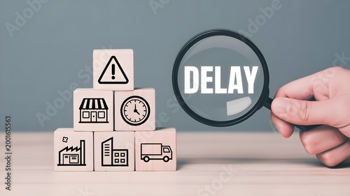 Business delay concept with wooden blocks and magnifying glass showing delay