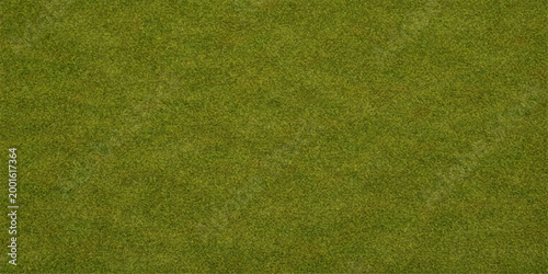 Lush green grass texture background of a natural lawn field suitable for a summer park garden or a professional golf turf meadow