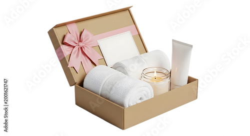 Relaxing spa gift box with white towels, a scented candle, and a skincare tube in a kraft paper box with a pink ribbon for a luxury home spa isolated on a transparent background