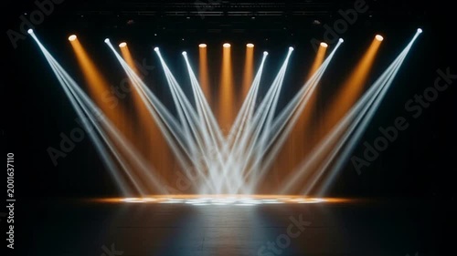 dramatic stage lights shining down on empty theater