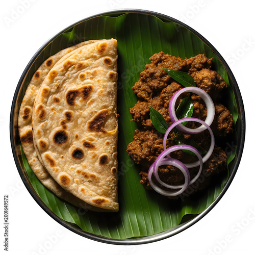 Indian round flatbread naan on green plate