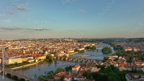 Prague historic bridges above Vltava river. Prague aerial perspective with Charles Bridge. Prague Charles Bridge districts. Prague cityscape with old architecture.