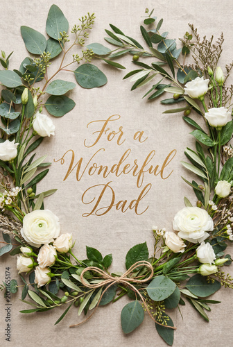 Rustic floral wreath with eucalyptus white roses and calligraphy text 