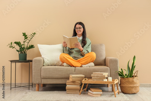 Beautiful woman reading boo...