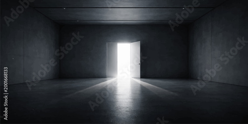 A shaft of light in the dark illuminates this empty interior hallway, creating a long perspective down the concrete corridor of an architectural building