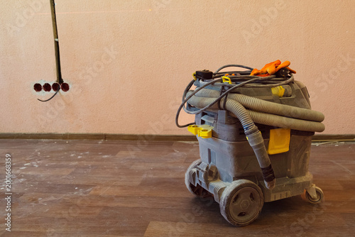 Принти на полотні Construction vacuum in residential space during post renovation cleaning with pa