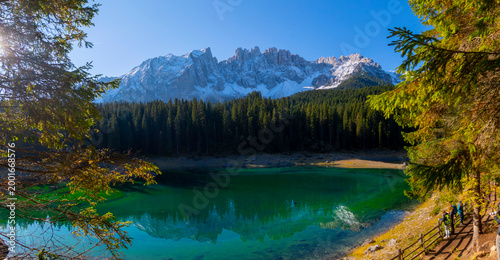Lake Carezza is a small mountain lake in the Dolomites in South Tyrol, Italy.