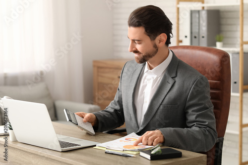Businessman working with co...