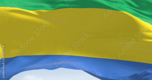 National flag of Gabon waving in the wind. Three equal horizontal bands of green, yellow, and blue. Seamless 3d render animation. Slow motion loop. Selective focus