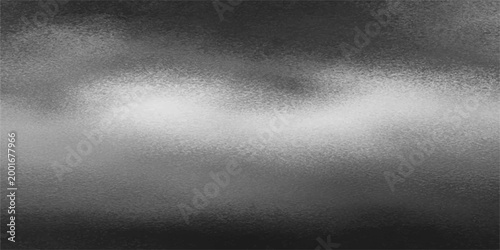 Abstract monochrome landscape capturing the ethereal beauty of clouds. A visually striking composition in shades of grey, evoking a sense of tranquility.