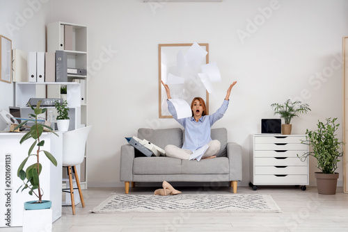 Shocked businesswoman throw...