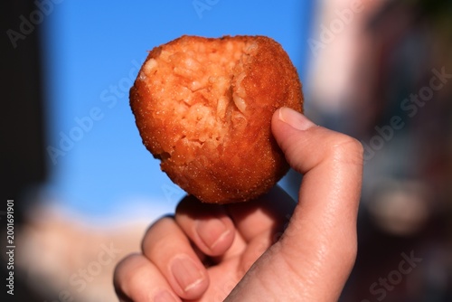 Obraz na płótnie Arancini deep fried rice ball, local street food in Bisceglie, Italy