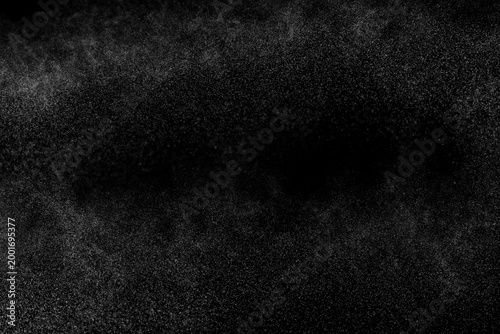 Water spray mist particle abstract black background texture