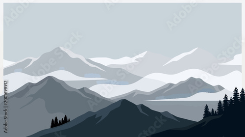 Snowy mountains tower above trees in a serene landscape scene outdoors