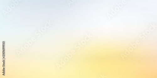 Photos Pastel gradient backdrop transitioning from blue sky tones to warm yellow and or