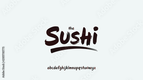 The sushi text written in a dark brown brush calligraphy style font with a decorative underline and a complete lowercase alphabet set displayed below on a solid light gray background surface