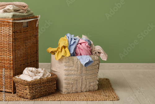 Wicker baskets with laundry...