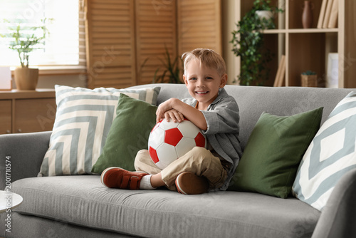 Cute little boy sitting on ...