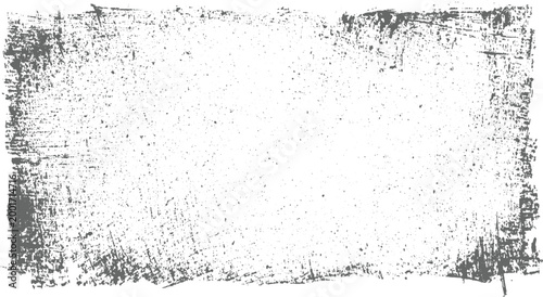 Distressed grey textured grunge border with scattered speckles on white background frame